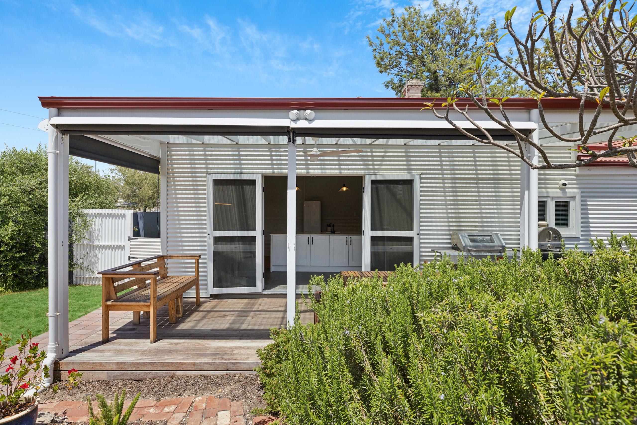 Tucked on the fringe of historic Port Adelaide, this 1910 corrugated iron-clad timber-framed cottage has been thoughtfully renovated to demonstrate that good design doesn't require a large footprint or a generous budget.